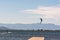 People practicing kite Surfing in Platja del Trabucador in the Delta del Ebro, Tarragona, Spain in summer 2020