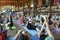 People practicing yoga poses during festival of Yoga and Vedic Culture