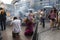 People pray at street shrine in Bangkok