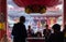 People praying at the entrance to the main hall. Sensoji Kannon temple. Asakusa, Tokyo. Japan