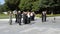 People Praying In Front Of The Eternal Flame At The Hiroshima Peace Park Japan 2015