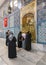 People praying in front of the tomb of Abu Ayyub al-Ansari at Eyup Sultan Mosque, Istanbul, Turkey