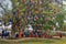 People are praying under Bodhi tree a place of Buddha enlightenment