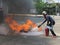 People preparedness for fire drill and training to use a fire safety tank.