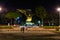 People on promenade at night in Piazza Vittoria