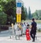 People protest defocused police man inspecting