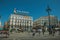 People at the Puerta del Sol Square with buildings in Madrid