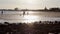 People in Quatro-Aguas East beach, at Tavira. Algarve.