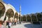 People queueing inside historic mosque