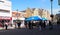 People Queueing two Metres Distance for Supermarket Food in Surrey UK