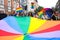 People with rainbow flags during the March of Equality, LGBT March