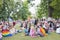 People with rainbow flags at Pride picnic event at Pride Village, Prague Pride festival