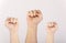 People raised fist air fighting for their rights, labor movement, election movement, copy space