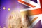 People raising hands on flag United Kingdom and Union Europe background. Brexit concept
