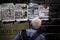 People reading the news at a press kiosk in the center of Athens