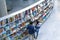 People reading and shopping at new cultural center of the Isla de la Cartuja. Seville, Spain.