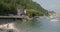 People relax on the beach of lake Garda