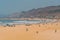 People relax on the beach in sunny day. Pismo Beach, Central California Coast