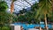 People relax in the pool with thermal water at Therme Bucharest, Romania.