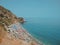 People relaxing on the beach in Maro, Spain