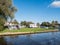 People relaxing near motorhomes on campsite in Earnewald, Alde Feanen, Friesland, Netherlands