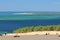 People relaxing on sandy dune of pilat