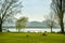 People relaxing in small park close to Museum of Transportation at the shores of Lake Lucerne in city of Luzern