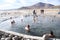 People rest at the geothermal hot water spring