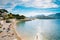 People resting at beach in Cassis, France.