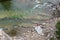 People are resting by the mountain river. Aerial view. Carpathians. Ukraine. Nature B