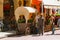 People resting in outdoor cafe in historic city centre. Lviv