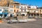 People resting on the square in the center of Mondello, is a small seaside resort near center of city Palermo.