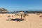 People are resting on a sunny day at the beach in Machico. Madeira Island