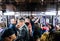 People ride Subway during afternoon in Manhattan
