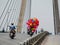 People riding motorbikes on the bridge in Hanoi, Vietnam