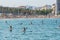 People riding Paddle Surf after COVID 19 La Barceloneta in Barcelona, Spain