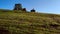 People riding quad bikes in mountains in summer.