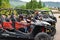 People riding quad bikes are queueing before the race.