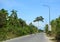 People riding scooters on rural road in Phu Quoc, southern Vietnam