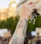 People ringing keys on the demonstration on Prague Wenceslas square against the current government and Babis