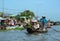 People rowing boat on Mekong river in Soc Trang, Vietnam