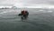 People rubber boatt in ice on water surface of Antarctica Ocean.