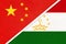 People`s Republic of China or PRC vs Tajikistan national flag from textile. Relationship between two asian countries