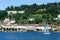 People sailing on a sailboat front of Orta