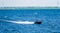 People sailing in a speedboat on the oosterschelde of tholen, Touristic water sport and transportation, popular city in zeeland,