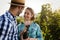 People sampling and tasting wines in vineyard