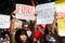 People are seen protesting with posters against the cuts in education funding by President Jair Bolsonaro in the city of Salvador