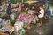 people sell fresh roses at night at the flower market Pak klong Talat in chinatown of Bangkok