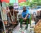 People selling sugarcane juice at market in Kolkata, India