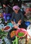 People selling vegetables and fruits at market in Kep, Cambodia